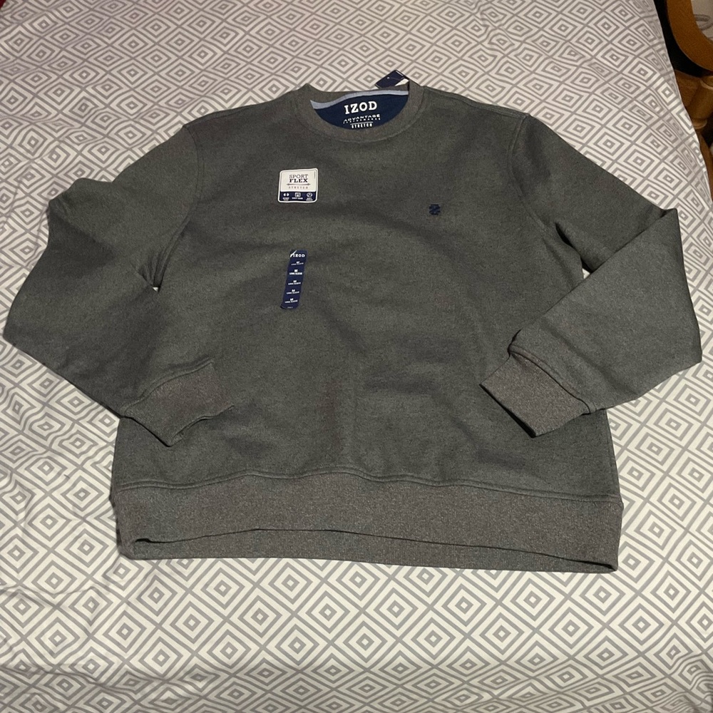 This is a gray jacket from the brand Izod. Size medium.